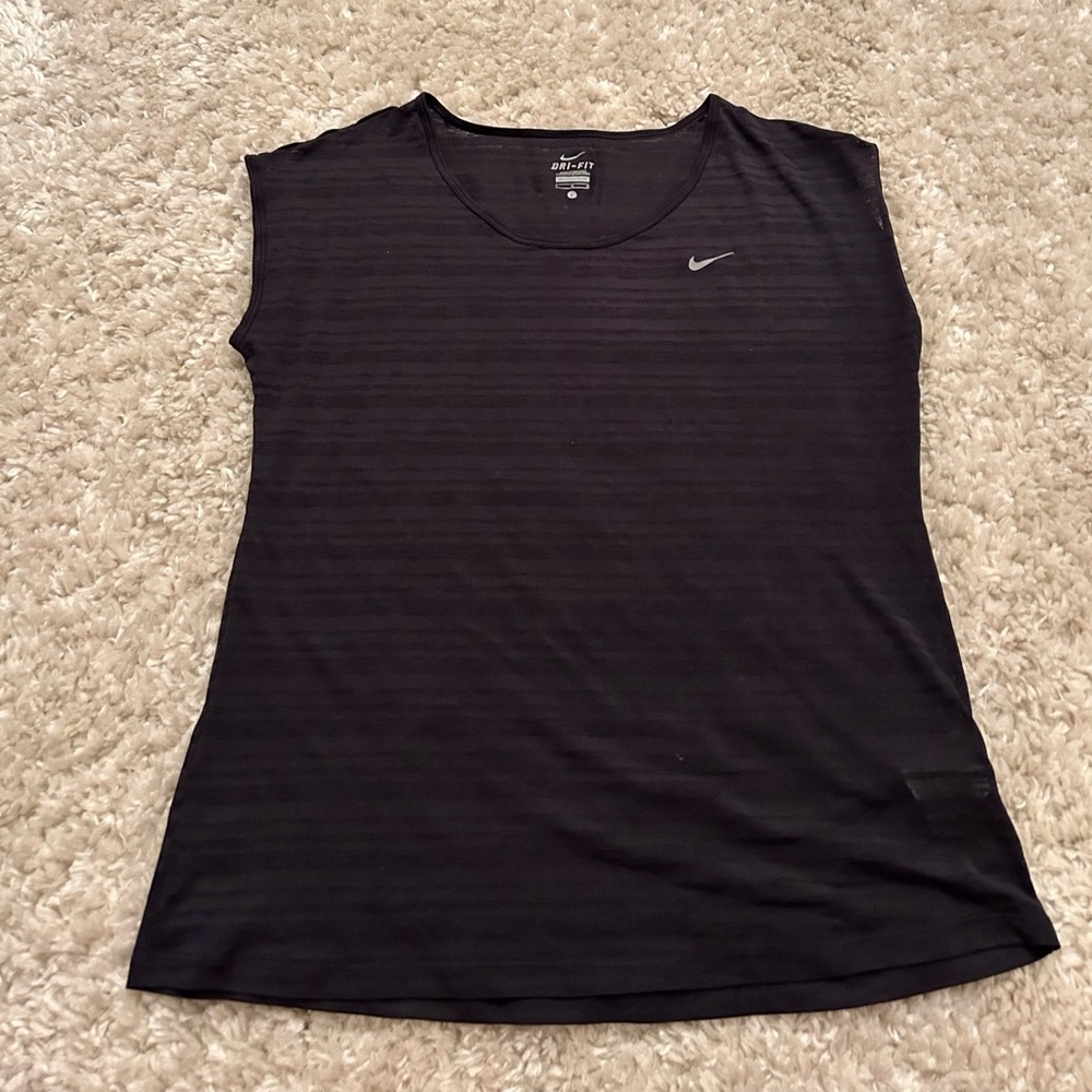 Nike exercise top. Size Large. Black with sheer pattern.
